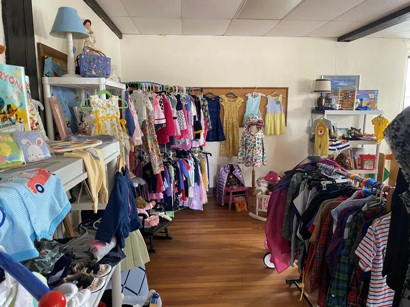 Racks of children’s clothes at The Sky’s the Limit Thrift Store